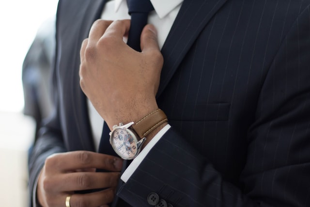 Man Adjusting the tie