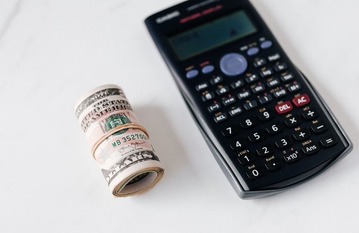 A Calculator and a wad of money