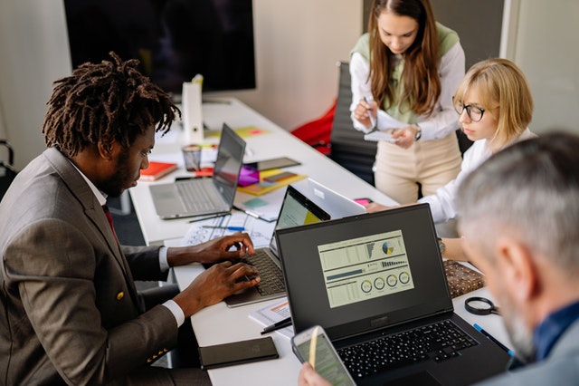 Employees Having a Meeting Inside the Office