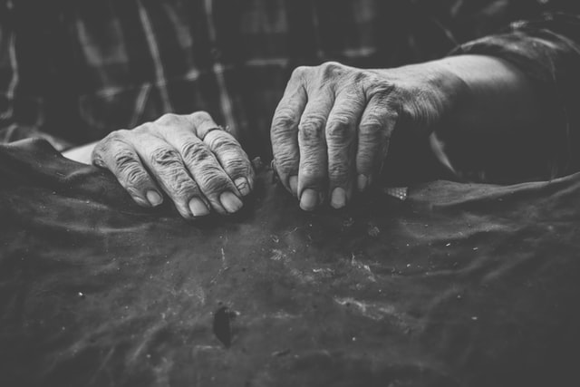 a person doing a craft with her hands