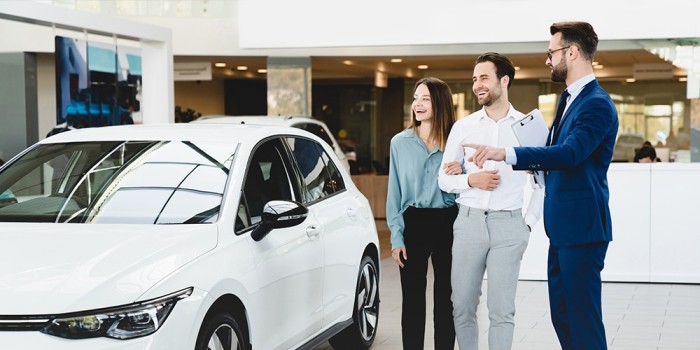 Couple buying a car