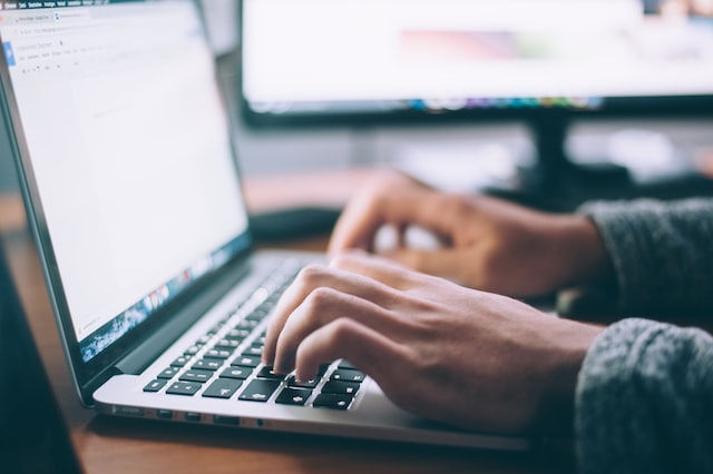 A person using a laptop computer