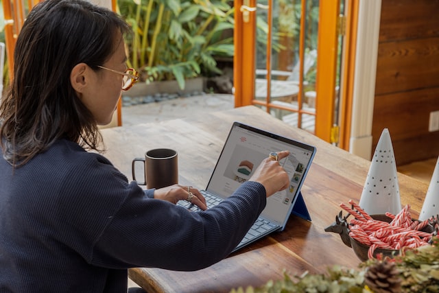 Woman interacting with a computer