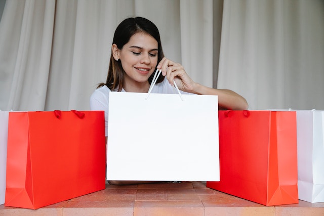 women with shopping bags