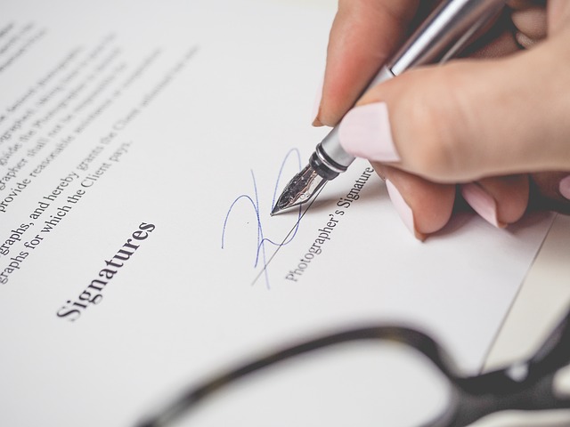 Person signing a document