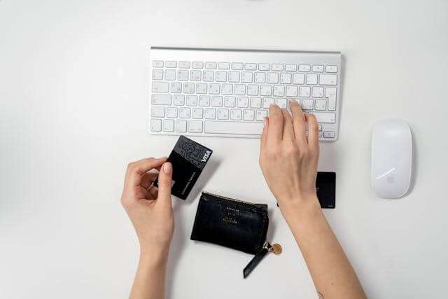 Person typing on a keyboard