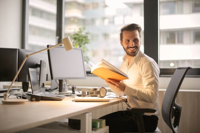 White man working at the office