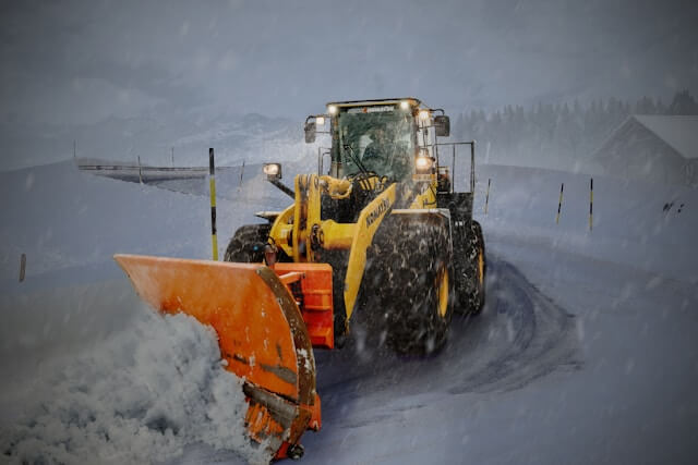 Tractor removing snow